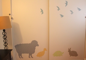 organic fabric animals on jack's wall